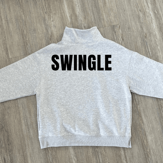 A light heather gray mock neck sweatshirt with a custom last name printed in bold black capital letters across the back.
